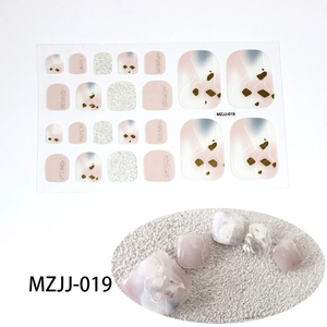 Detail of 5D starry nail stickers with pink marble and blue glitter for pedicures