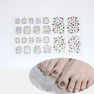Detail view of 5D glitter toe nail stickers with mosaic rhinestones and star pattern