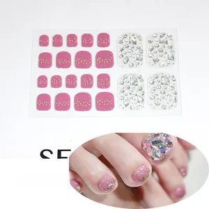 Detailed view of pink purple 5D rhinestones toe nail stickers with glitter finish