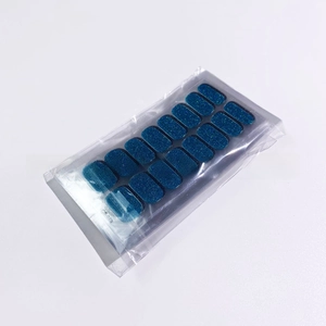 Detail view of blue glitter nail wraps with 14 pieces in CS-029 packaging on white background