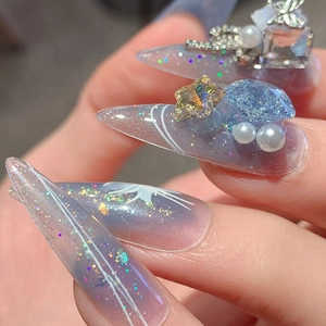Blue-purple gradient press-on nails with 3D butterfly, stars, and pearl decorations