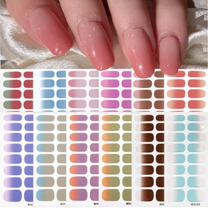 Set of 12 gradient nail stickers in various colors including pink, blue, and purple tones