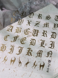 Detail of gothic style gold alphabet nail art stickers with metallic finish LTH-018