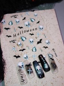 Detail of Halloween nail stickers JY-0008 featuring skull and bat motifs on long nails