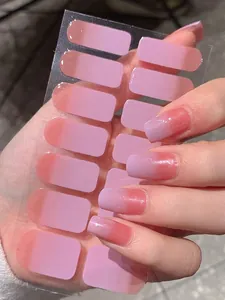 Light purple gradient press-on nails with silver glitter detail and 14-piece set display