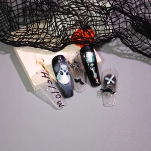 Halloween matte 3D coffin press-on nails featuring skull, bat, and ghost designs