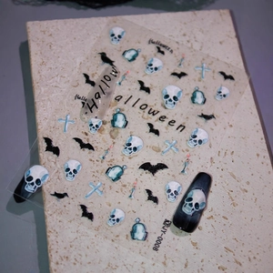 Halloween nail stickers with blue skull and bat patterns on high-quality matte decals