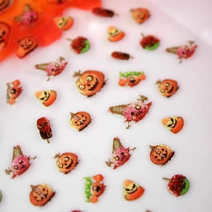3D Halloween nail stickers featuring embossed pumpkin and skull ice cream decals
