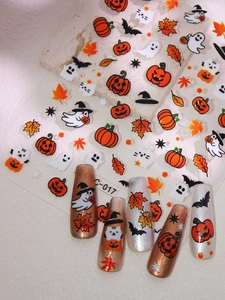 Detailed view of Halloween nail stickers with pumpkins, ghosts and bats theme