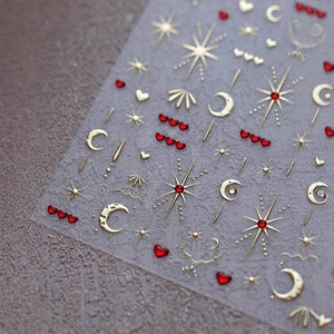 5D embossed nail stickers featuring gold stars, moons and 3D red hearts on clear backing