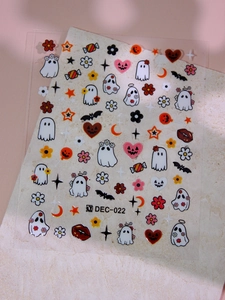 Close-up of Halloween nail art stickers with cute ghost and pumpkin patterns DEC-022