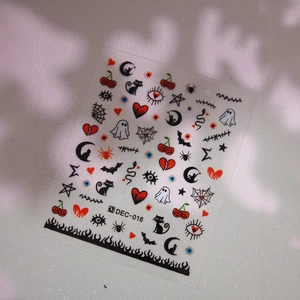Halloween nail stickers with ghosts, bats, and pumpkins on high-quality adhesive decals