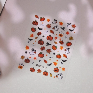 Halloween nail art stickers with pumpkin, ghost, and bat patterns on white background
