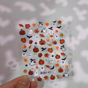 Halloween nail art decals featuring pumpkin, ghost, and bat patterns for DIY manicure