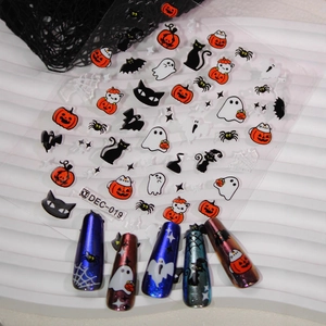 Halloween nail stickers with pumpkins, ghosts, and black cats on white background