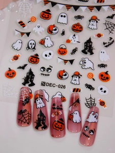 Macro detail of Halloween nail stickers DEC-026 featuring pumpkins, ghosts and spider webs