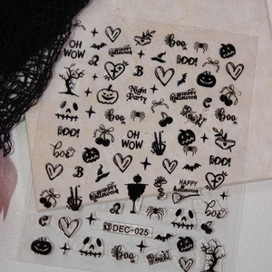 Halloween nail art stickers featuring black pumpkin, spider, and bat designs on white base