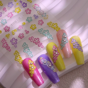 5D embossed floral nail stickers set with colorful 3D flowers and sparkling rhinestones