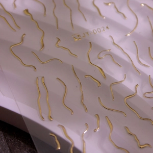 Golden wavy line 3D nail art stickers JY-0024 with metallic finish and adhesive backing