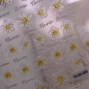 5D Embossed yellow flower nail stickers with 3D floral texture and Dream script labels