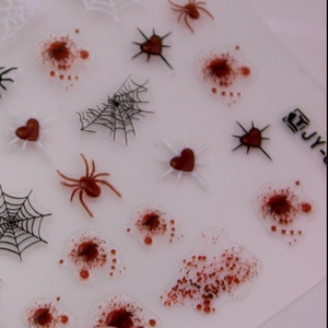 Halloween nail stickers with red blood splatter and black spider web jelly designs