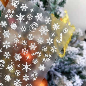5D white embossed Christmas nail decals with snowflakes and Santa Claus patterns