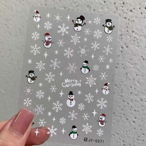 3D Christmas nail stickers with white snowmen and snowflakes for DIY festive manicure