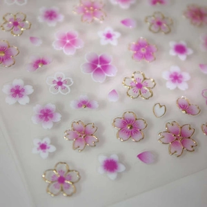 3D pink cherry blossom nail art stickers with gold foil accents and gradient petals