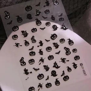 3D embossed Halloween nail stickers featuring black bats, ghosts, and pumpkin silhouettes