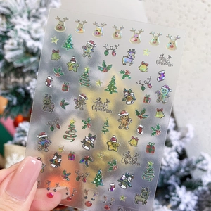 Laser holographic Christmas nail stickers featuring reindeer and bell patterns