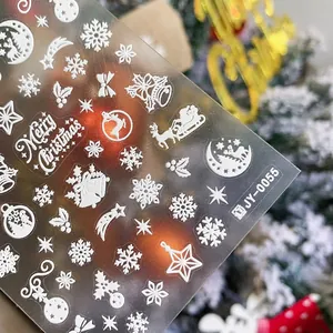 5D embossed white Christmas nail decals with snowflake and reindeer patterns