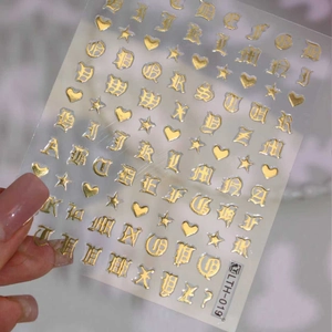 Autocollants nail art lettres gothiques dorées avec cœurs et étoiles, modèle LTH-019
