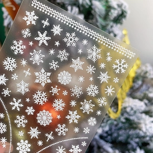 Self-adhesive 3D snowflake nail stickers with white embossed winter holiday designs