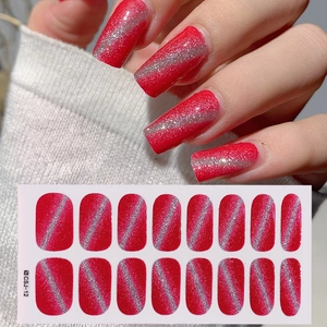 Detail view of red cat eye nail stickers CSJ-12 with 16 adhesive shimmering pieces