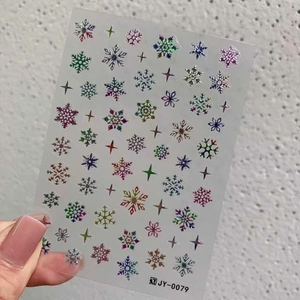 Détail de stickers à ongles holographiques flocons de neige avec fini métallique JY-0079