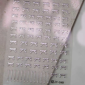 Metallic silver bow nail art stickers JY-049 with linear designs on clear backing