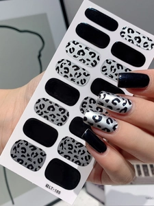 Detail of leopard and zebra print nail stickers LT-185 applied on natural fingernails
