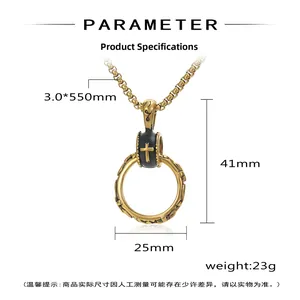 Macro view of vintage gold cross ring pendant with black enamel and detailed engraving