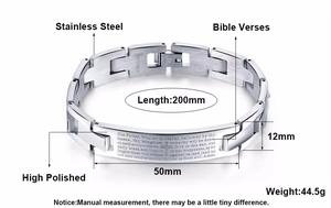 Detail of stainless steel bracelet featuring engraved Lord's Prayer and cross on a curved plate