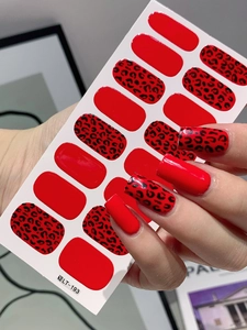 Detail view of red and leopard print nail stickers with 14 pieces for DIY nail art design