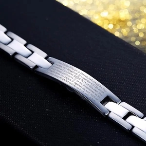 Classic silver stainless steel bracelet featuring engraved Lord's Prayer and cross symbol