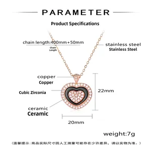 Detailed view of rose gold double heart necklace with black ceramic and sparkling cubic zirconia