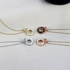 Minimalist ceramic bow necklaces with micro-inlaid diamonds in four assorted colors