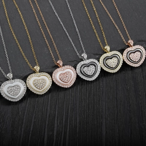 Diamond heart pendant necklaces in gold, silver and rose gold with enamel inlay