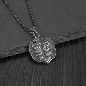Retro stainless steel necklace featuring an eagle pendant with a cross on a box chain