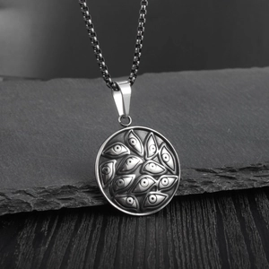 Gothic vintage stainless steel evil eye pendant necklace with black box chain on slate
