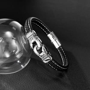 Bracelet pour homme en cuir tressé noir avec boucle vintage en acier inoxydable poli