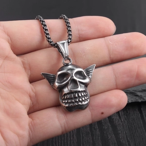 Retro winged skull necklace in silver finish with black beaded chain punk style