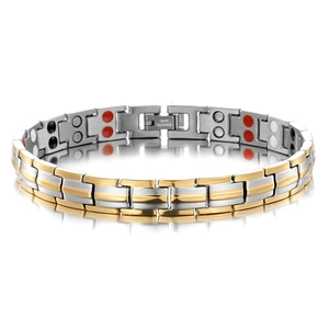 Macro shot of bicolour magnetic therapy bracelet with stainless steel stamp and reflections