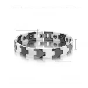 Polished black and white ceramic magnetic bracelet showing 11mm width and 213mm length details